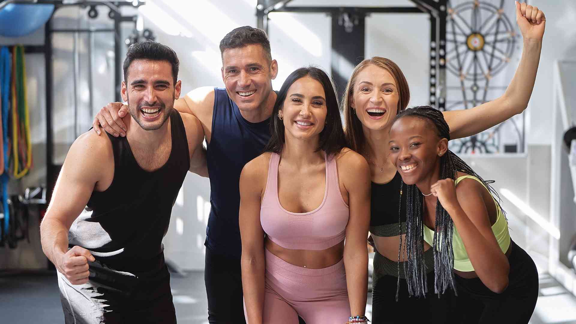 Friends celebrating together at the gym